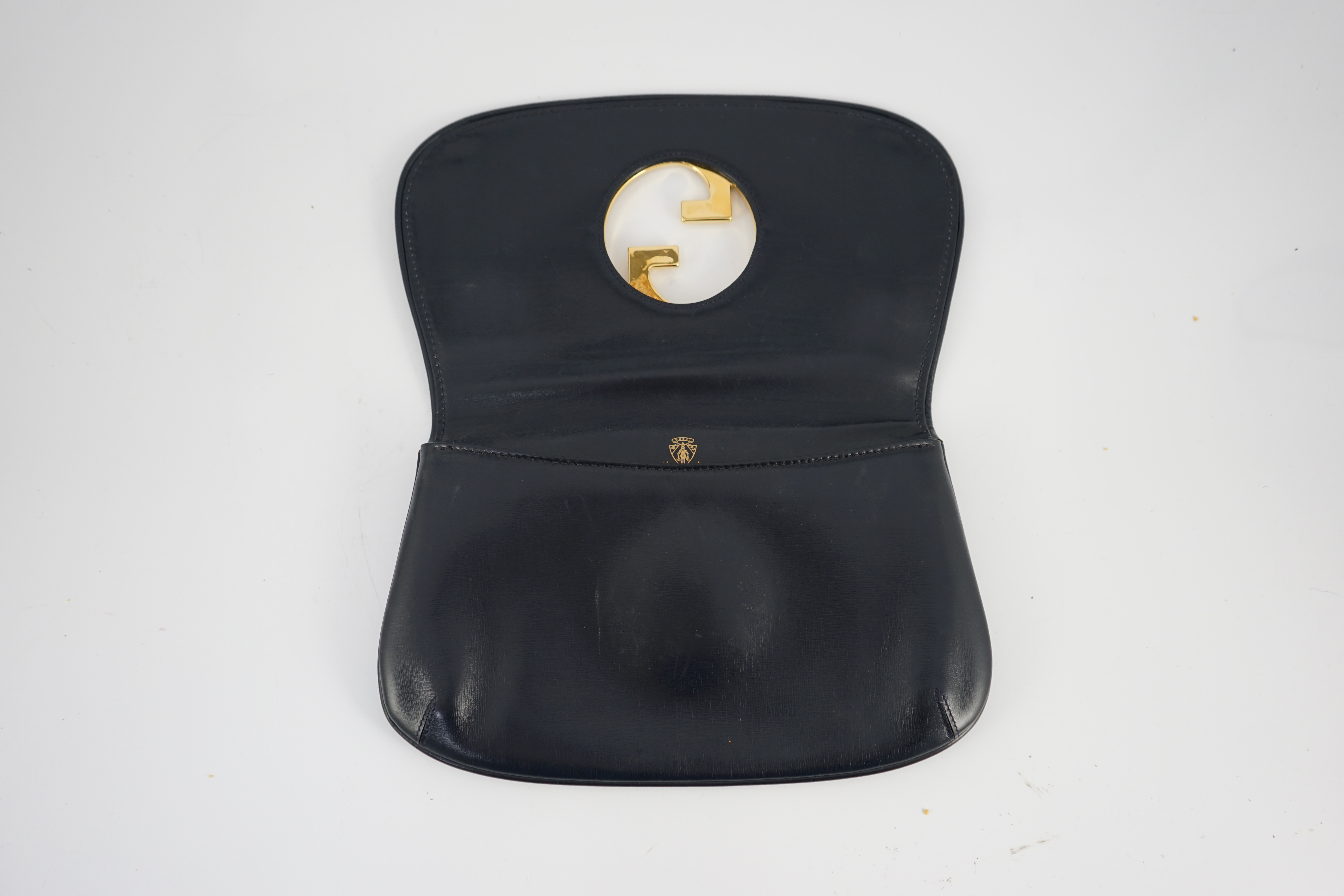 A vintage Gucci Blondie Unicorn navy leather clutch bag, width 28cm, depth 4cm, height 16cm